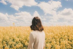 Woman in front of Flower Field